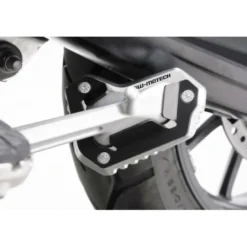Base maggiorata per cavalletto laterale Nero/Argento. Triumph Tiger 1050 Sport (13-).