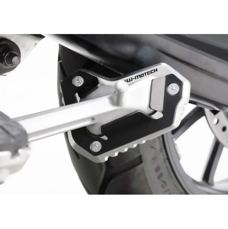 Base maggiorata per cavalletto laterale Nero/Argento. Triumph Tiger 1050 Sport (13-).